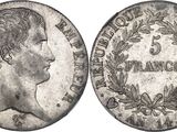 une pièce d'argent portant l'image d'une tête de femme