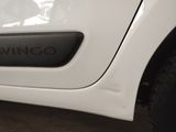 the door handle of a white car with the word wingo written on it