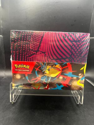 a close up of a pokemon trading card holder on a table