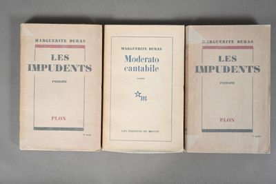 three books sitting on top of a table next to each other