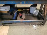 an image of a workbench with a lot of tools in it
