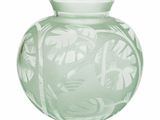 a glass vase with a design on it on a white background