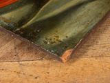 a close up of a book on a wooden table