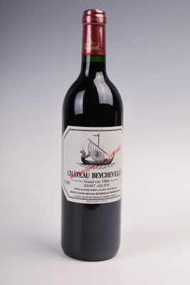 a bottle of wine that is sitting on a table