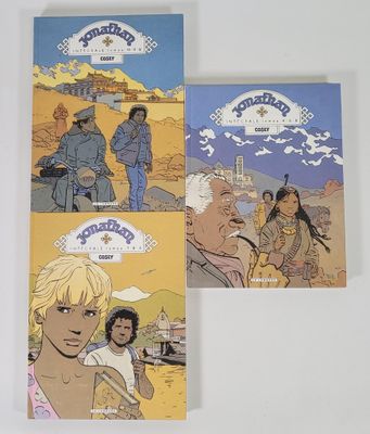 trois livres posés sur une surface blanche, avec une image représentant un homme et une femme