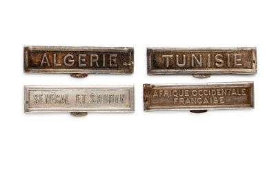 four different types of metal nameplates on a white background