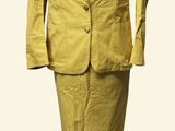an image of a yellow suit on a mannequin