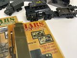 a lot of toy military vehicles on display on the table