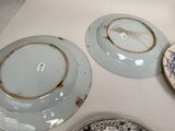 three plates that are sitting on a table