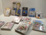a lot of nintendo wii games on the table