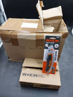 a box with a pair of scissors on top of it