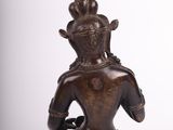 an image of a statue of a woman sitting in a lotus position