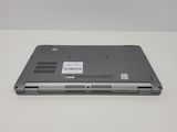 a laptop that is sitting on a white table