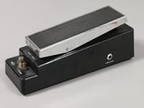 an electric guitar pedal sitting on top of a black box
