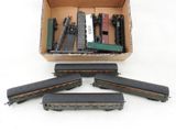 a box of toy trains sitting on a white surface