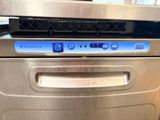 an image of a stainless steel dishwasher in a kitchen