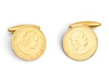 a pair of gold coin cufflinks on a white background