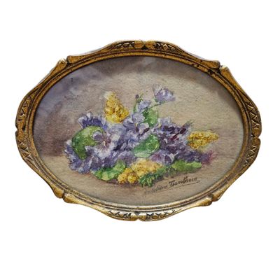 painting of a bouquet of flowers in a gold frame on a white background