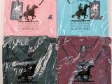 four polo shirts in different colors and designs on a table