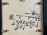 a picture of a clock that is hanging on a wall