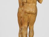 an image of a statue of a man holding a woman ' s head