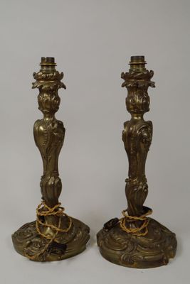 pair of antique brass candlesticks with birds and flowers