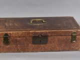 an old suitcase that is sitting on a table