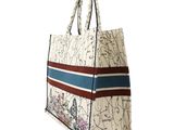 an image of a white bag with blue and red stripes