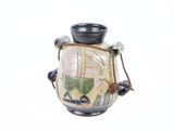 a small vase with a handle on a white background