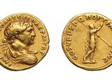 a gold coin with an image of a man on it