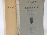 two books are sitting side by side on a white surface