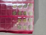 a picture of a pink box with coins in it