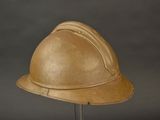 a helmet on a stand on a gray background