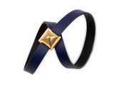 a close up of a blue leather bracelet with a gold metal clasp