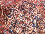 an image of a close up of a rug on a wooden floor