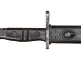 an old knife with a black handle on a white background