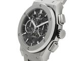 a picture of a stainless steel watch on a white background