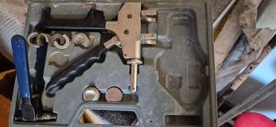 a tool kit in a tool box on a table
