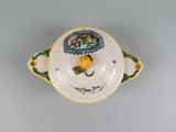 an image of a small bowl with a flower on it