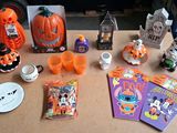 a table with various halloween decorations and decorations on it