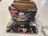 a box of tools on a pallet in a store