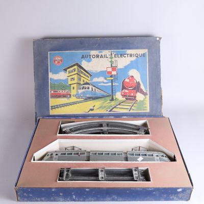 a box with a train set in it on a table