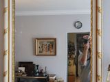 a man taking a picture of himself in a mirror
