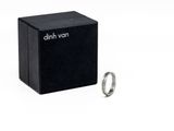 an image of a ring sitting on top of a black box