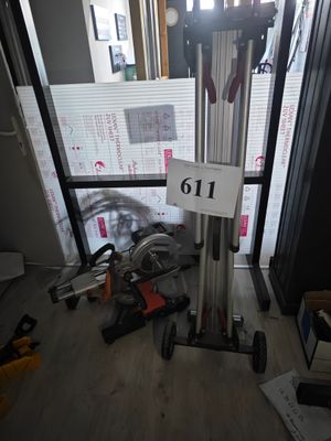 a picture of a room with a lot of clutter and tools on the floor