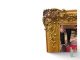 someone is taking a picture of their reflection in a mirror