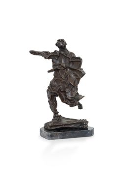 an image of a bronze statue of a man with a sword