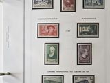 a picture of a collection of stamps on a binder