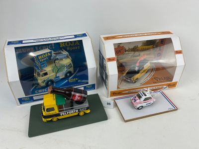 une boîte contenant un camion miniature et une boîte contenant une voiture miniature