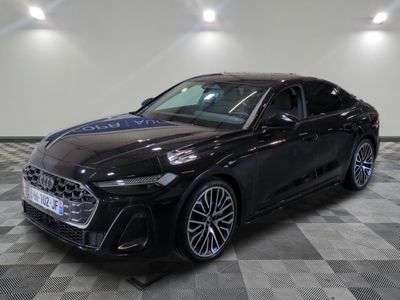 2020 audi s5 sedan in black with a checkered floor